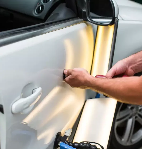 Removing a dent on a side door